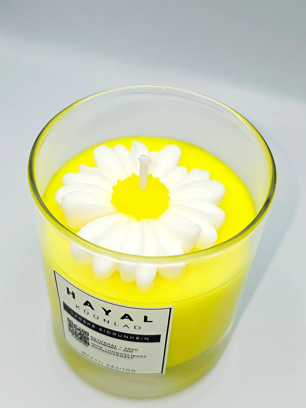 kookosküünal Värsek sidrunhein kookosküünal Värsek sidrunhein. Õrn aroomiküünal